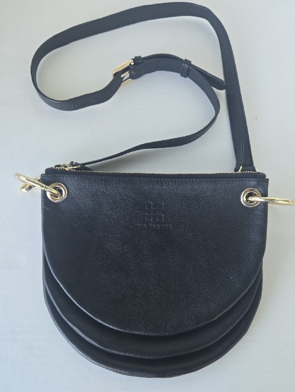 TIC TAC TOE Black Leather Crossbody Bag with Gold Ring Detail